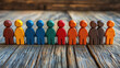 © 沈军 贡 - A row of colorful wooden figures representing different people