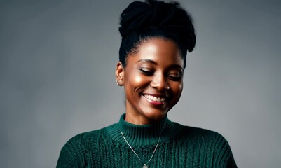 Wall Mural - smiling african american woman in green sweater over grey background