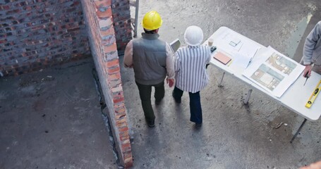 Canvas Print - Above, handshake and people on construction site for plan, collaboration or technology at table. Contractor, welcome and woman with tech for information, brainstorming or architect design in morning