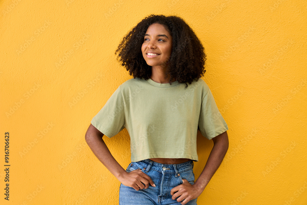 Happy cheerful pretty cool African American gen z teen girl standing at ...