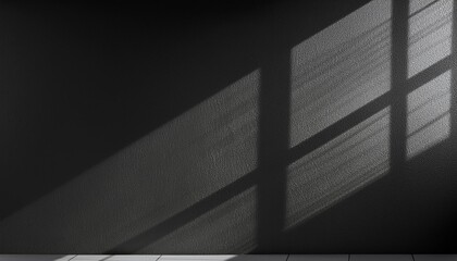 black wall with shadows on the wall