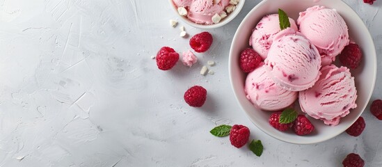 Poster - A top view of pink ice cream with raspberries on a white table offering copy space for text in a horizontal background setting