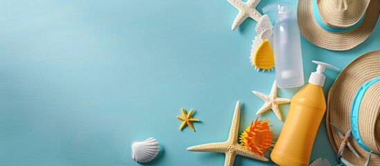 Aufkleber - Top view of sunblock bottles and beach gear on a light blue backdrop with room for text features a copy space image