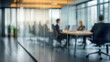 © melhak - Business Meeting of Executives in Blurred View Behind Glass Wall - Strategy Planning - Office Workplace