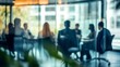 © melhak - Business Meeting of Executives in Blurred View Behind Glass Wall - Strategy Planning - Office Workplace