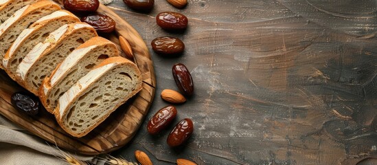 Poster - Freshly sliced bread with dates arranged from a top view providing ample copy space image