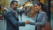 © The Little Hut - Indian businessman greeting and making handshake with a businesswoman outdoors in city walkway : Generative AI