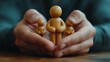 © The Little Hut - Man guarding small wooden human figures Close up of male hands and little pawn people on desk Responsible team leader creates safe workplace and protects his employees Corporate safety : Generative AI