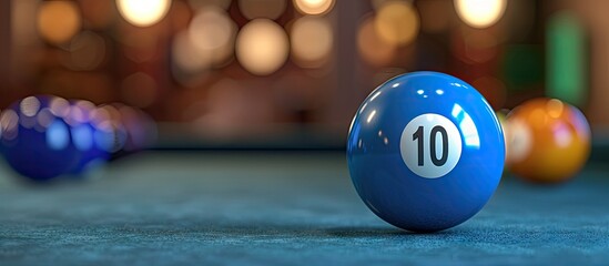 Blue billiard ball number ten displayed on a table with copy space image