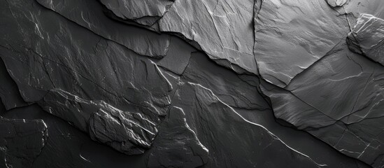 Fototapete - Slate background in dark grey color provides a rich texture for your copy space image