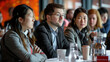 © Chatchanan - Engaged business group discussing strategies at a seminar