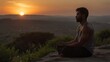 © Wulan - A person meditating in nature with the sunset casting a golden light
