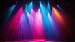 © Alpa - Music concert stage with colorful spotlights creates a lively and energetic atmosphere.