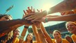 © TranNgoc - A vibrant image of a sports team stacking their hands one on top of another, focused on the hands, joyful expressions in the background, outdoor stadium setting. Background blurred with stadium seats,