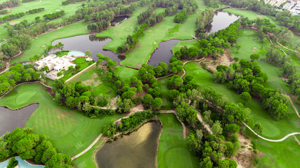 Wall Mural - Aerial view of golf course and luxury villas in Belek, Turkey. Scenic panoramic view of golf fairway