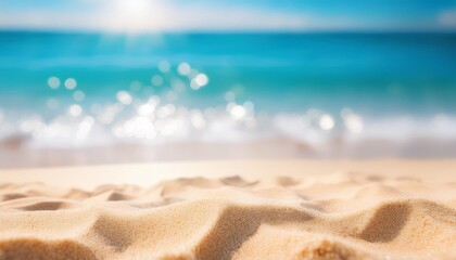 Wall Mural - sand with blue sea beach summer defocused background with glittering of sunlights