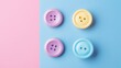 © VK Studio - Pastel-colored buttons laid out against a split pink and blue background, creating a playful and visually striking contrast.