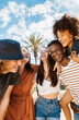 © Xavier Lorenzo - Group of multiracial happy young friends having fun together enjoying summer vacation on the beach - Focus on african couple