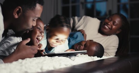 Canvas Print - Happy, night and a black family with a tablet on the bed for tickling, playful and laughing at a show. Home, relax and African parents with children, fun and technology in the dark for a cartoon