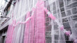 © nikolettamuhari - Pink and White Urban Drapes on Building.