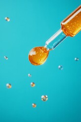 Poster - ottle pipette dropper close up and Liquid yellow-orange retinol or vitamin c gel or serum on a blue background stock photo 