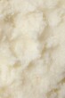© New Africa - Natural shea butter as background, top view