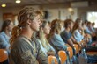 © Alienmarsh - Young Man Listening Attentively in a Classroom