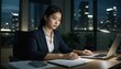 © Chenda - Asian office white-collar in dark background night shift