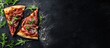 © ZEUS - Two slices of gourmet pizza with prosciutto, arugula and sprinkled with salt on a black background with copy space.