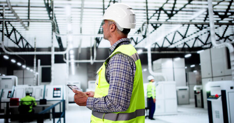 Wall Mural - Inspection Engineer Worker At Construction Site