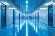 © Ben Kuang - A futuristic blue corridor with reflective floors and bright lighting.