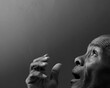 © herlanzer - man praying to god with hands together Caribbean man praying with black grey background with people stock image stock photo