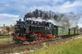 a German narrow gauge steam locomotive heading for the mountains