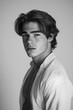 © BrandwayArt - Young man posing in black and white portrait with soft expression