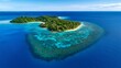 © Darunee - A bird's-eye view of a tropical island surrounded by crystal-clear sea, with coral reefs visible below the surface