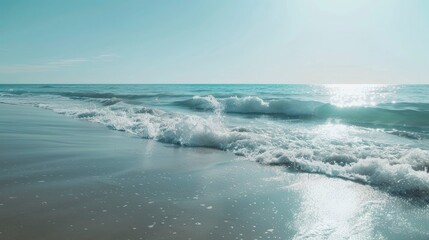 Poster - A serene beach with gentle waves and a clear blue sky.