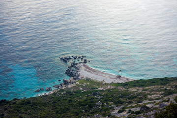 Amazing view down to the sea from the mountain in Othonoi island, north-west of Corfu, Greece, at dusk