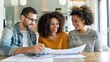 © KKC Studio - Young Couple Discussing Tax Implications with Financial Advisor at Home