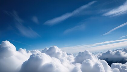 Wall Mural - white clouds high in the sky at windy winter day background