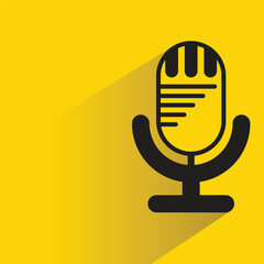 Canvas Print - microphone icon with shadow on yellow background