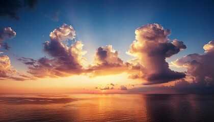 Wall Mural - beautiful cloudscape over the sea sunrise shot