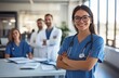 © Sagar - Beautiful young female medical doctor is looking at camera and smiling