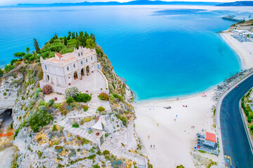 Wall Mural - Tropea, Calabria, Italy. Church of Santa Maria dell'Isola. Monastery and coastline with azure crystal-clear water