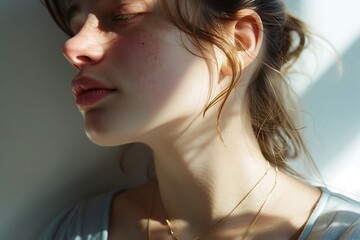 Wall Mural - Close-up Portrait of Young Woman with Freckles and Soft Skin