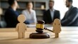 © inthasone - A family wooden figure and gavel on a judge's table in a courthouse during a court hearing. with a lawyer in the background. Family law concept, divorce lawyer, joint custody of child, and alimony.