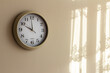 © Voyagerix - Clock on wall at home showing ten hours
