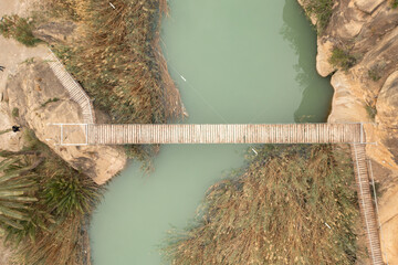 Aerial view of beautiful wooden suspension bridge in Murcia