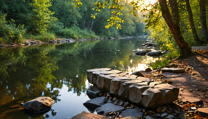 Banc en pierre au bord de la rivière au coucher du soleil