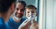 © Daniel - Shaving cream, bathroom and dad with son or reflection, happy and playful practice for growth or development. Father, boy and mirror in home for learning facial care, 