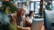 © visoot - In the office, elderly people happily worked on computers in modern office, creating a cheerful atmosphere. Generative AI.
